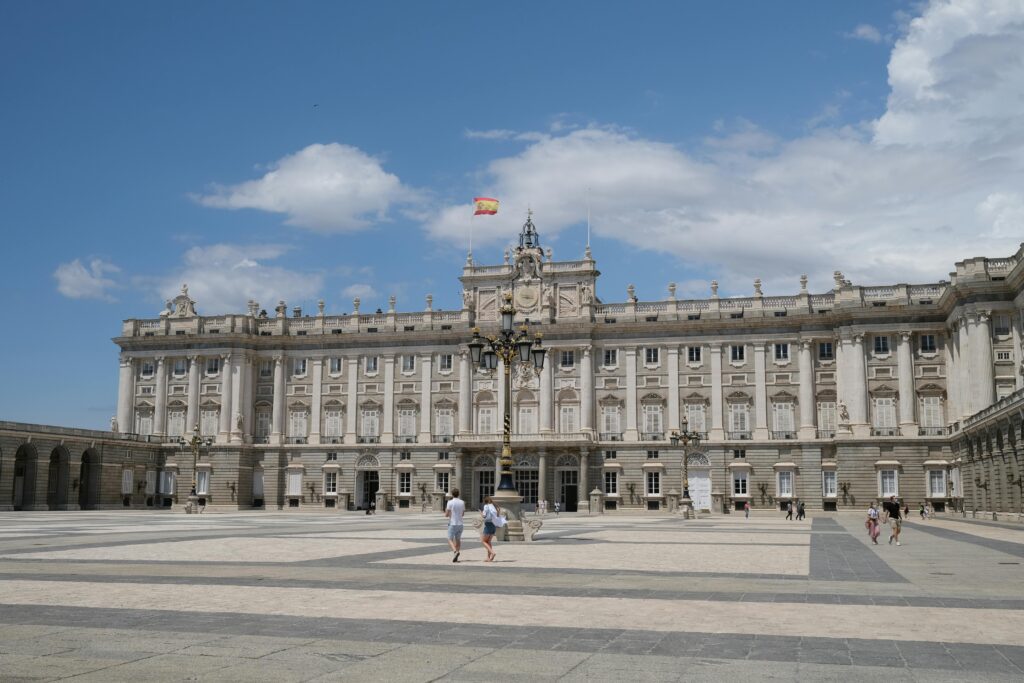 A Shot a Palace with Spanish Flag on It 